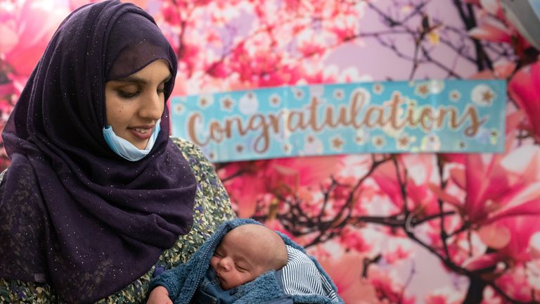 Lalene Malik, 23, with her two-week-old baby Mohammed Ibrahim at Northwick Park Hospital in Harrow. Ms Malik went to A&E with stomach cramps on March 26 and gave birth to her baby in the toilets, having not known she was pregant and with no outward physical signs of pregnancy. Picture date: Wednesday April 13, 2022.
