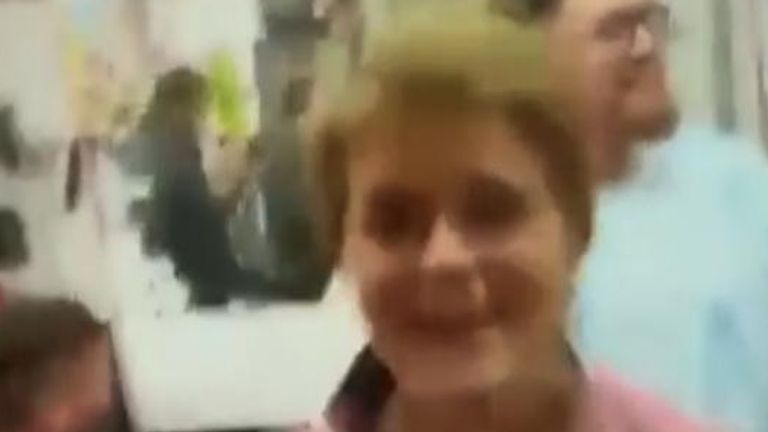 Nicola Sturgeon seen without a face mask at a barber shop