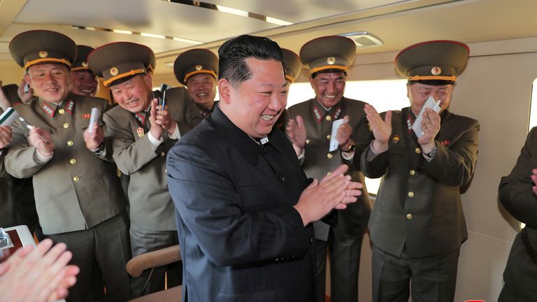 North Korean leader Kim Jong Un gestures as he watches the test-firing of a new-type tactical guided weapon according to state media, North Korea, in this undated photo released on April 16, 2022 by North Korea&#39;s Korean Central News Agency (KCNA). KCNA via REUTERS ATTENTION EDITORS - THIS IMAGE WAS PROVIDED BY A THIRD PARTY. REUTERS IS UNABLE TO INDEPENDENTLY VERIFY THIS IMAGE. NO THIRD PARTY SALES. SOUTH KOREA OUT. NO COMMERCIAL OR EDITORIAL SALES IN SOUTH KOREA.
