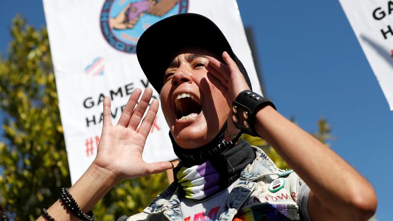 Actor and activist Vico Ortiz shouts slogans as they attends a rally in support of the Netflix transgender employee walkout ?Stand Up in Solidarity? to protest the streaming of comedian Dave Chappelle?s new comedy special, in Los Angeles, California, U.S. October 20 2021. REUTERS/Mario Anzuoni