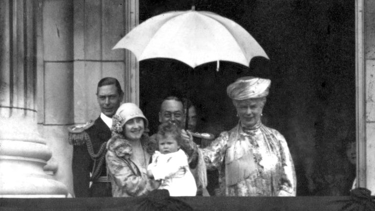 The Duke and Duchess of York with King George V and Queen Mary and Princess Elizabeth, on the balcony of Buckingham Palace. 1927