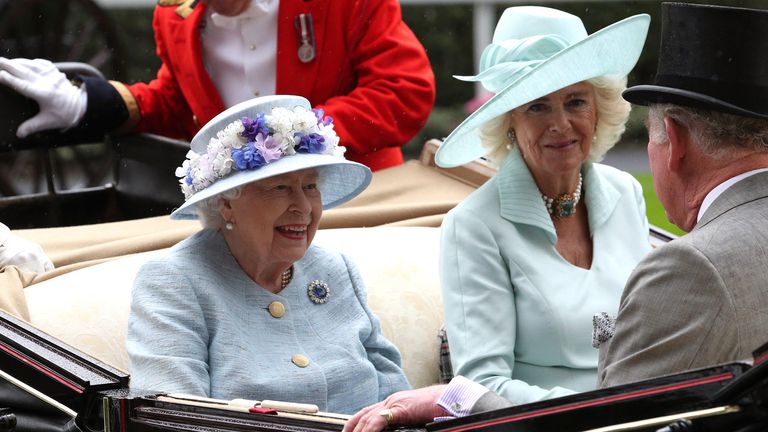 Queen Elizabeth II (left) and Duchess of Cornwall during the royal procession during day two of Royal Ascot at Ascot Racecourse.