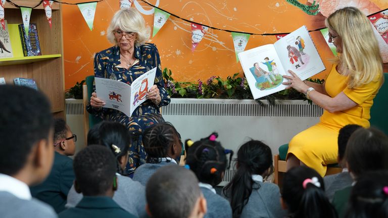 The Duchess of Cornwall, Patron of BookTrust, reading to schoolchildren during her visit to Griffin Primary School, Nine Elms, London, with Waterstones Children&#39;s Laureate, Cressida Cowell (right) to open the new &#39;Life-changing Library&#39;. Picture date: Tuesday June 21, 2021.