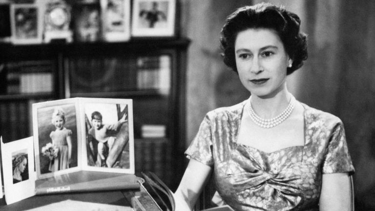 File photo dated 25/12/57 of Queen Elizabeth II, in the Long Library at Sandringham, after making the first televised Christmas day broadcast to the nation. The Queen is holding the copy of &#39;Pilgrim&#39;s Progress&#39;, from which she read a few lines during her message. Issue date: Sunday January 30, 2022.