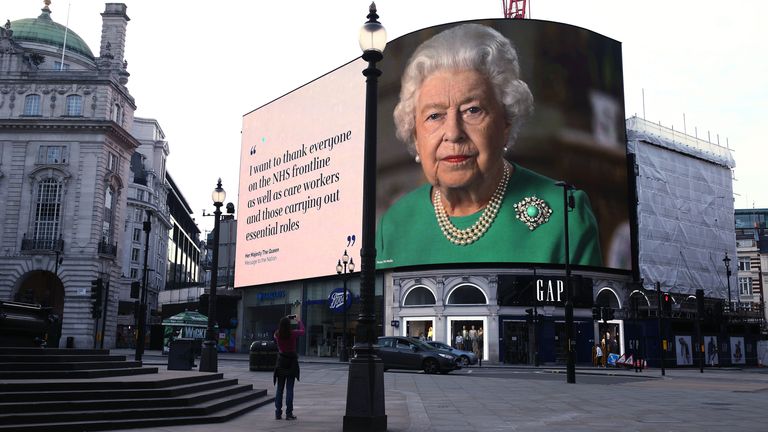An image of Queen Elizabeth II and quotes from her broadcast on Sunday to the UK and the Commonwealth in relation to the coronavirus epidemic are displayed on lights in London&#39;s Piccadilly Circus. PA Photo. Picture date: Wednesday April 8, 2020. See PA story HEALTH Coronavirus. Photo credit should read: Yui Mok/PA Wire                                                                            