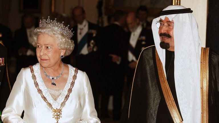 King Abdullah of Saudi Arabia (right) with Queen Elizabeth II (left) before the State Banquet at Buckingham Palace in London after the first day of the Saudi Kings visit.
