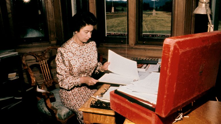 The Queen at her despatch box whilst at Balmoral.
