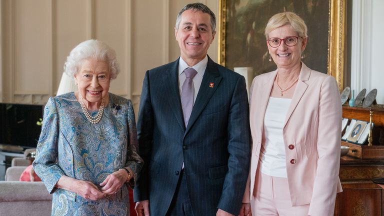 The monarch poses for a photo with the President of Switzerland Ignazio Cassis and his wife Paola Cassis