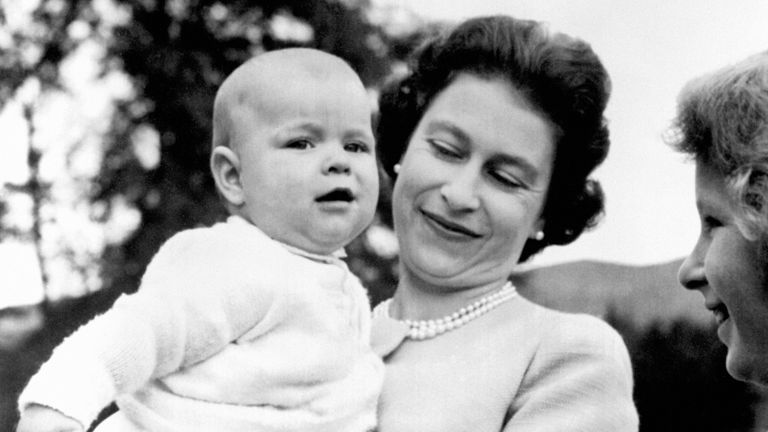 The Queen and a baby Prince Andrew in the grounds at Balmoral in 1960