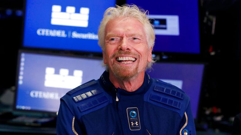Sir Richard Branson, Founder of Virgin Galactic, is interviewed on the floor of the New York Stock Exchange, Monday, Oct. 28, 2019. (AP Photo/Richard Drew)