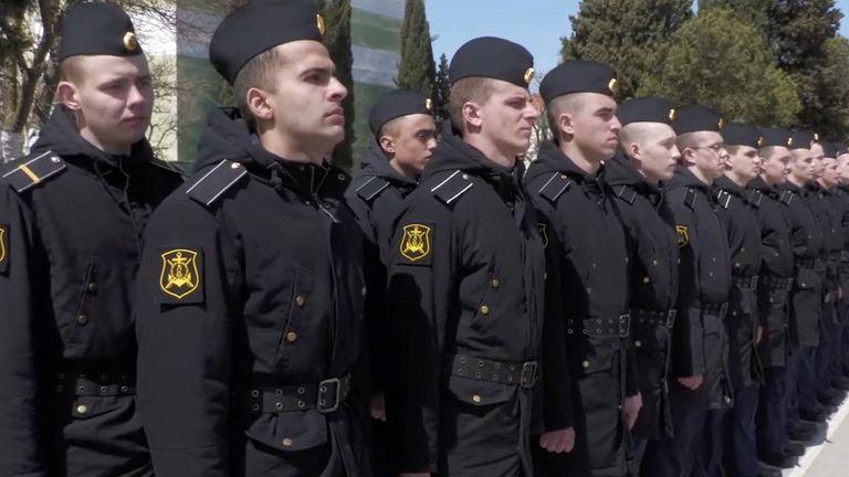 Crew members from the sunken missile cruiser Moskva line up for a meeting with the head of the Russian navy, Admiral Nikolai Yevmenov, in Sevastopol, Crimea, in this still image taken from a video released on April 16, 2022. Russian Defence Ministry/Handout via REUTERS ATTENTION EDITORS - THIS IMAGE WAS PROVIDED BY A THIRD PARTY. NO RESALES. NO ARCHIVES. MANDATORY CREDIT
