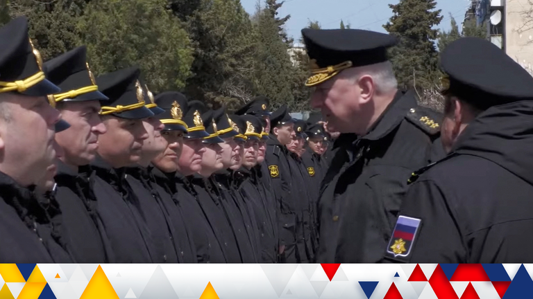 Crew members from the sunken missile cruiser Moskva line up for a meeting with the head of the Russian navy, Admiral Nikolai Yevmenov, in Sevastopol, Crimea, in this still image taken from a video released on April 16, 2022. Russian Defence Ministry/