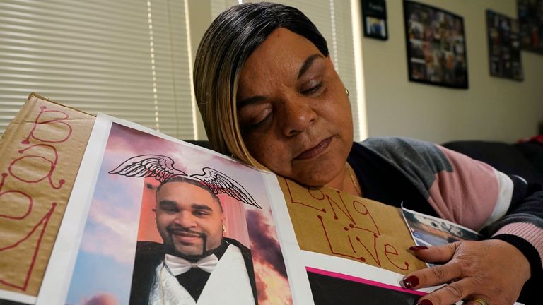 Penelope Scott with a photo of her son, De&#39;vazia Turner, one of the victims killed in a mass shooting in Sacramento


