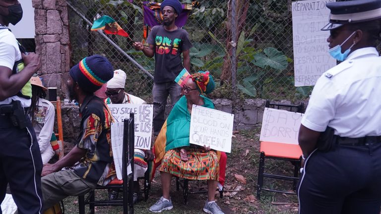 A small protest outside the Fond Doux Cocoa Plantation in Saint Lucia during the visit by the Earl and the Countess of Wessex, as they continue their visit to the Caribbean, to mark the Queen&#39;s Platinum Jubilee. Picture date: Wednesday April 27, 2022.