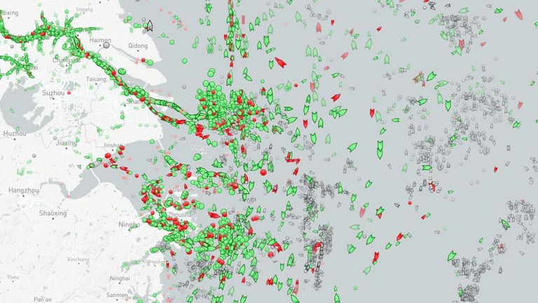 The green and red dots show the mass congestion of cargo vessels and tankers of the coast of Shanghai. Pic: MarineTraffic 