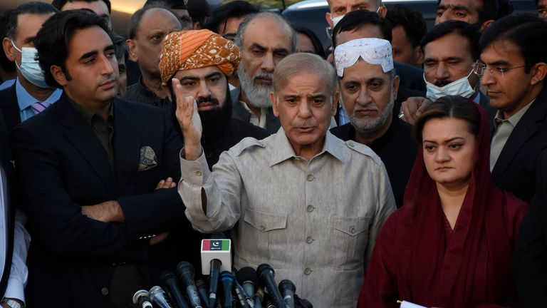 Pakistan&#39;s opposition leader Shahbaz Sharif, center, speaks to reporters while other opposition leaders watch outside the National Assembly, in Islamabad, Pakistan, Thursday, March 31, 2022. Pakistan&#39;s parliament on Thursday adjourned a debate on the political survival of Prime Minister Imran Khan after the opposition had called for a no-confidence vote on the embattled premier. (AP Photo)