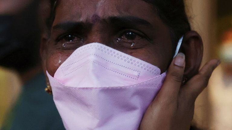 Panchalai Supermaniam, the mother of Malaysian drug dealer on death row inmate Nagaenthran Dharmalingam, cries as she thanks supporters and activists after her final challenge was dismissed, outside the High Court in Singapore April 26, 2022. REUTERS / Edgar Su