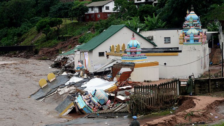 The Vishnu Hindu Temple was severely damaged by flooding on Mhlathuzana river in Chatsworth, outside  Durban, South Africa, Tuesday, April 12, 2022. Prolonged rains and flooding in South Africa&#39;s KwaZulu-Natal province have claimed dozens of lives, according to local officials. (AP Photo/Str)