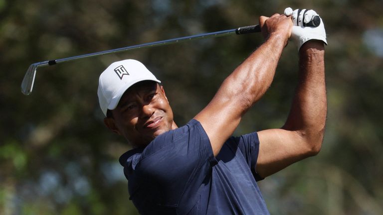 Golf - The Masters - Augusta National Golf Club - Augusta, Georgia, U.S. - April 4, 2022 Tiger Woods of the U.S. hits his tee shot on the 4th tee during a practice round REUTERS/Mike Segar