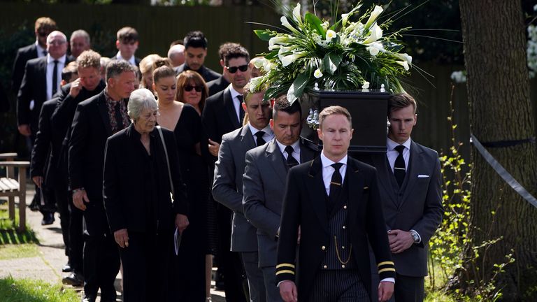 The coffin of Tom Parker from The Wanted is carried during the funeral at St Francis of Assisi Church in Queensway, Petts Wood, southeast London, after he died aged 33 last month, 17 months after being diagnosed with an inoperable brain tumor.  Picture date: Wednesday April 20, 2022.