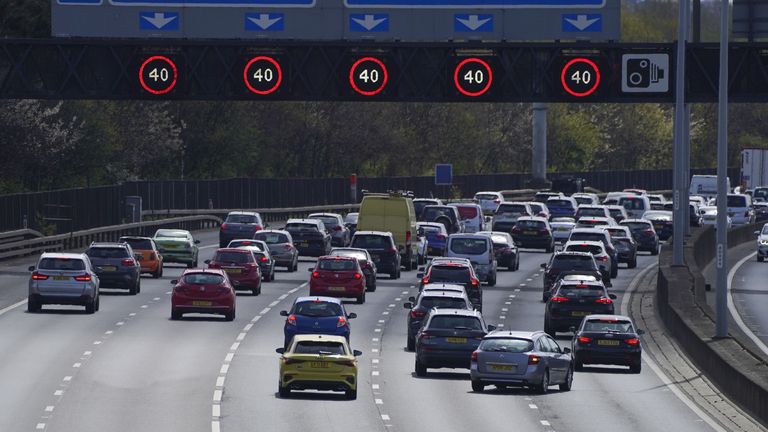 Queuing traffic on the M25 near Egham, Surrey. Picture date: Sunday April 10, 2022