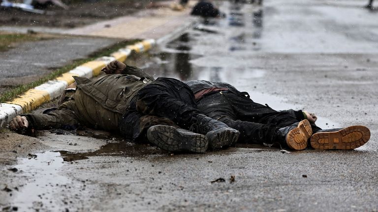 SENSITIVE MATERIAL. THIS IMAGE MAY OFFEND OR DISTURB Bodies of civilians, who according to residents were killed by Russian soldiers, lie down on the street, amid Russia&#39;s invasion on Ukraine, in Bucha, Ukraine April 3, 2022. REUTERS/Zohra Bensemra 