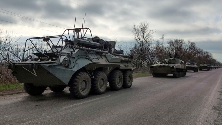 A Russian military convoy moves on a highway in an area controlled by Russian-backed separatist forces near Mariupol, Ukraine, Saturday, April 16, 2022. Mariupol, a strategic port on the Sea of Azov, has been besieged by Russian troops and forces from self-proclaimed separatist areas in eastern Ukraine for more than six weeks. (AP Photo/Alexei Alexandrov)


