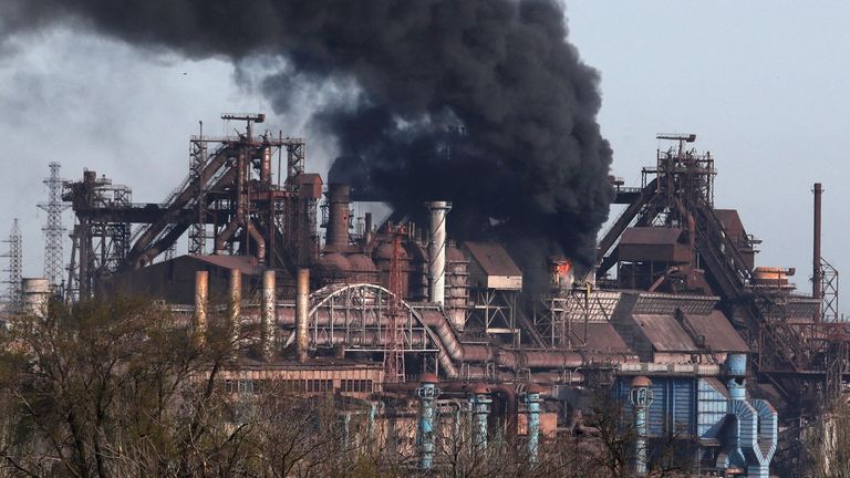 Smoke rises above the Zovstal steelworks