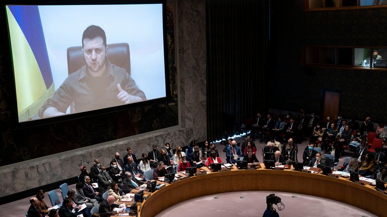 Ukrainian President Volodymyr Zelenskyy speaks via remote feed during a meeting of the UN Security Council, Tuesday, April 5, 2022, at United Nations headquarters. Zelenskyy will address the U.N. Security Council for the first time Tuesday at a meeting that is certain to focus on what appear to be widespread deliberate killings of civilians by Russian troops. (AP Photo/John Minchillo)