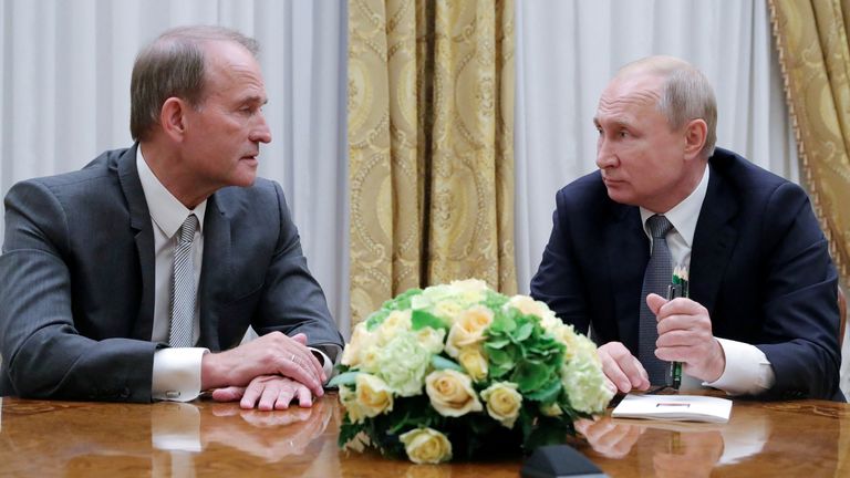 FILE PHOTO: Russia & # 39 ;s President Vladimir Putin (R) attends a meeting with leader of Ukraine & # 39 ;s Opposition Platform - For Life party Viktor Medvedchuk in Saint Petersburg, Russia July 18, 2019. Sputnik / Mikhail Klimentyev / Kremlin via REUTERS ATTENTION EDITORS - THIS IMAGE WAS PROVIDED BY A THIRD PARTY./File Photo