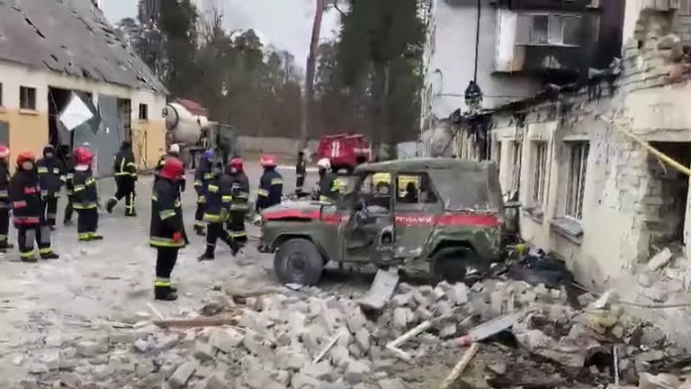 Firefighters clear up debris amid Russia&#39;s ongoing invasion of Ukraine, in Pushcha-Vodytsya on 14 April