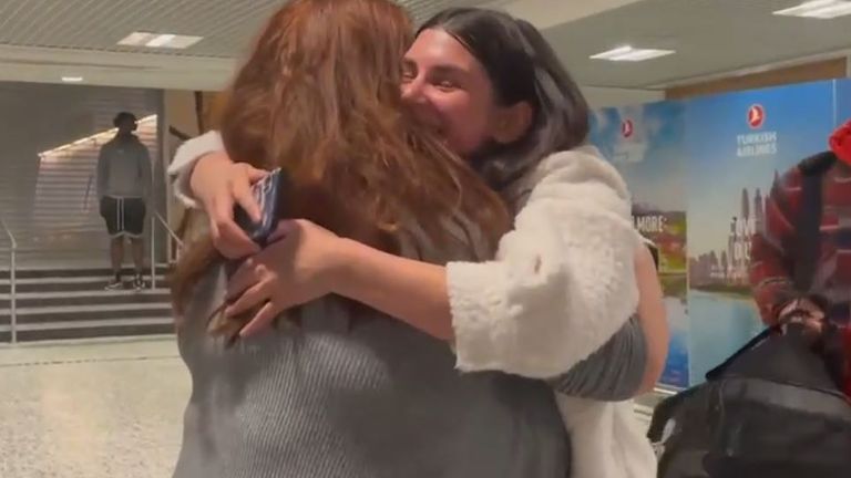 Yuliia Korzun, right, and her British sponsor Emma Nishigaki hugged as they met in Birmingham Airport