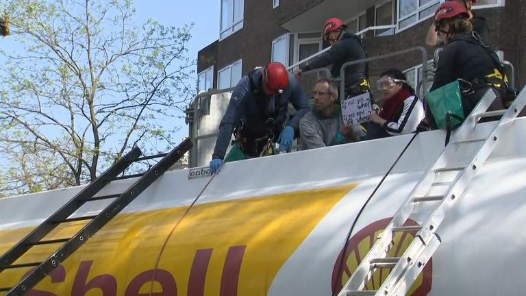 At least six people have been arrested after a group of Extinction Rebellion protesters climbed onto an oil tanker in central London. 