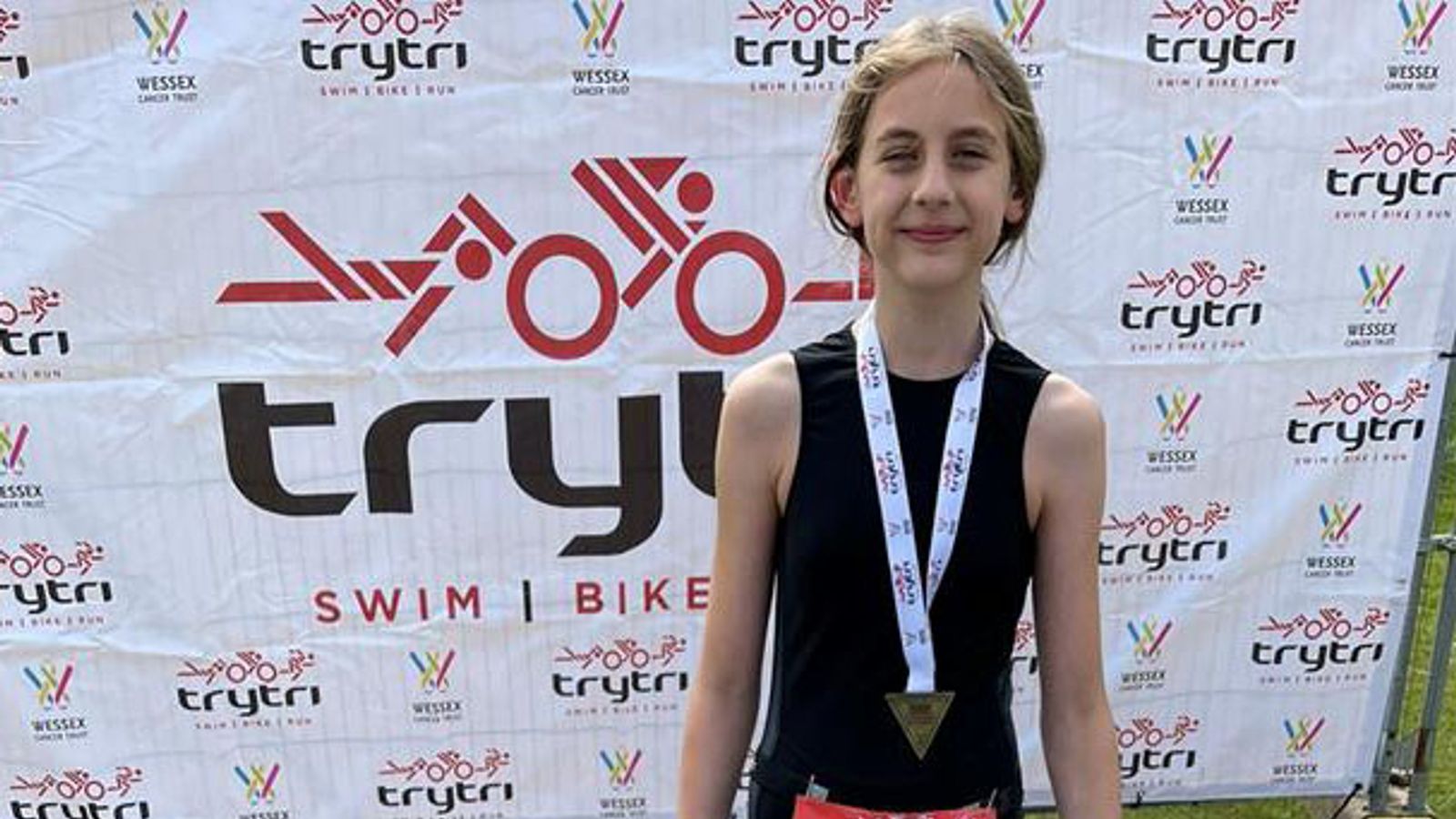Girl, 10, takes on triathlon to raise money in memory of stillborn brother