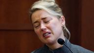 Amber Heard testifies in the courtroom at the Fairfax County Circuit Courthouse