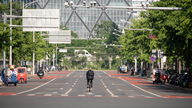 Sky&#39;s Ton Cheshire cycles through the empty streets of Beijing 