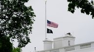 The American flag flies at half-staff at the White House in Washington, Thursday, May 12, 2022, as the Biden administration commemorates the 1 million American lives lost due to COVID-19. (AP Photo/Susan Walsh)