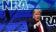 Former US President Donald Trump gestures during the National Rifle Association (NRA) annual convention in Houston, Texas