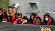 A group of people thought to be migrants are brought in to Dover, Kent, onboard a Border Force vessel following a small boat incident in the Channel. Picture date: Monday May 9, 2022.