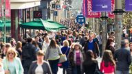 ESPLS..Crowds of people passing shops and businesses on Buchanan Street, one of Glasgow&#39;s busiest shopping streets.