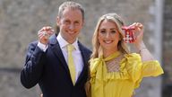 Sir Jason Kenny and Dame Laura Kenny after they received their Knight Bachelor and Dame Commander medals awarded by the Duke of Cambridge during an investiture ceremony at Windsor Castle Picture date: Tuesday May 17, 2022.

