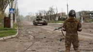 A serviceman of Donetsk People&#39;s Republic militia stands at a check point in Mariupol, in territory under the government of the Donetsk People&#39;s Republic, eastern Ukraine, Wednesday, May 4, 2022. (AP Photo/Alexei Alexandrov)