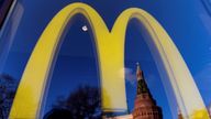 FILE PHOTO: A logo of the McDonald&#39;s restaurant is seen in the window with a reflection of Kremlin&#39;s tower in central Moscow, Russia March 9, 2022. REUTERS/Maxim Shemetov/File Photo
