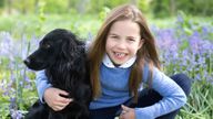 Princess Charlotte and pet dog Orla. Pic: The Duchess of Cambridge