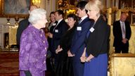 Queen Elizabeth II meets Joanna Lumley during a Reception for Contemporary British Poetry at Buckingham Palace, London.