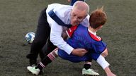 Australia&#39;s Prime Minister Scott Morrison accidentally crash tackles a child during a game of soccer in Devonport while campaigning for the federal election Wednesday, May 18, 2022. Australia hold a national election on Saturday. (Mick Tsikas/AAP Image via AP)
PIC:AP

