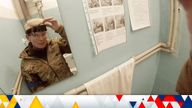 Yuliia Paievska looks in the mirror and turns off her camera in Mariupol on 27 February

 
