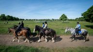 People riding horses along Wimbledon Common in London. Picture date: Friday May 6, 2022.