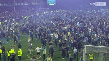 Fans invade pitch as Everton secure PL survival