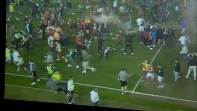 Sharp attacked by fan during Forest-Blades pitch invasion